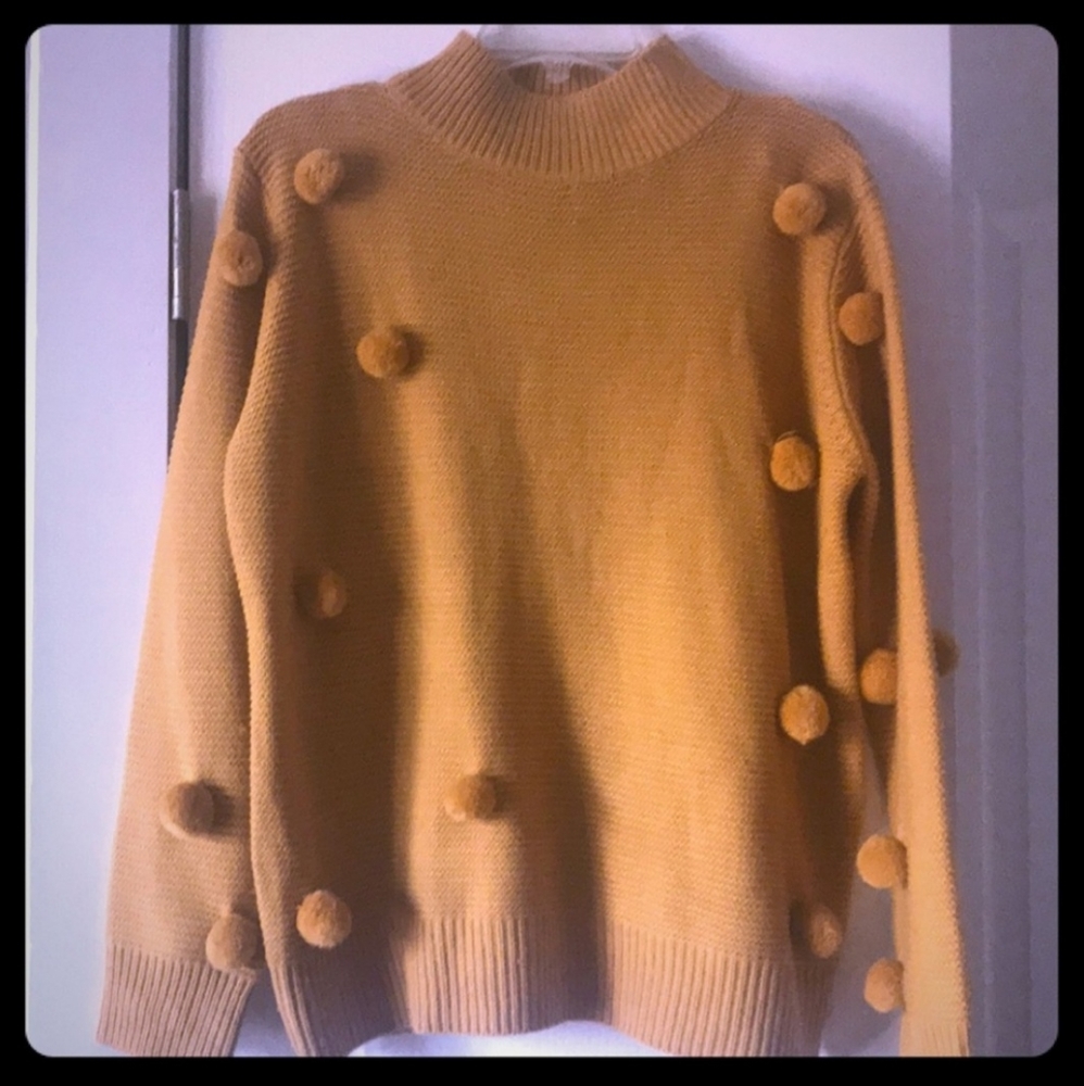 Tann pom-pom sweater